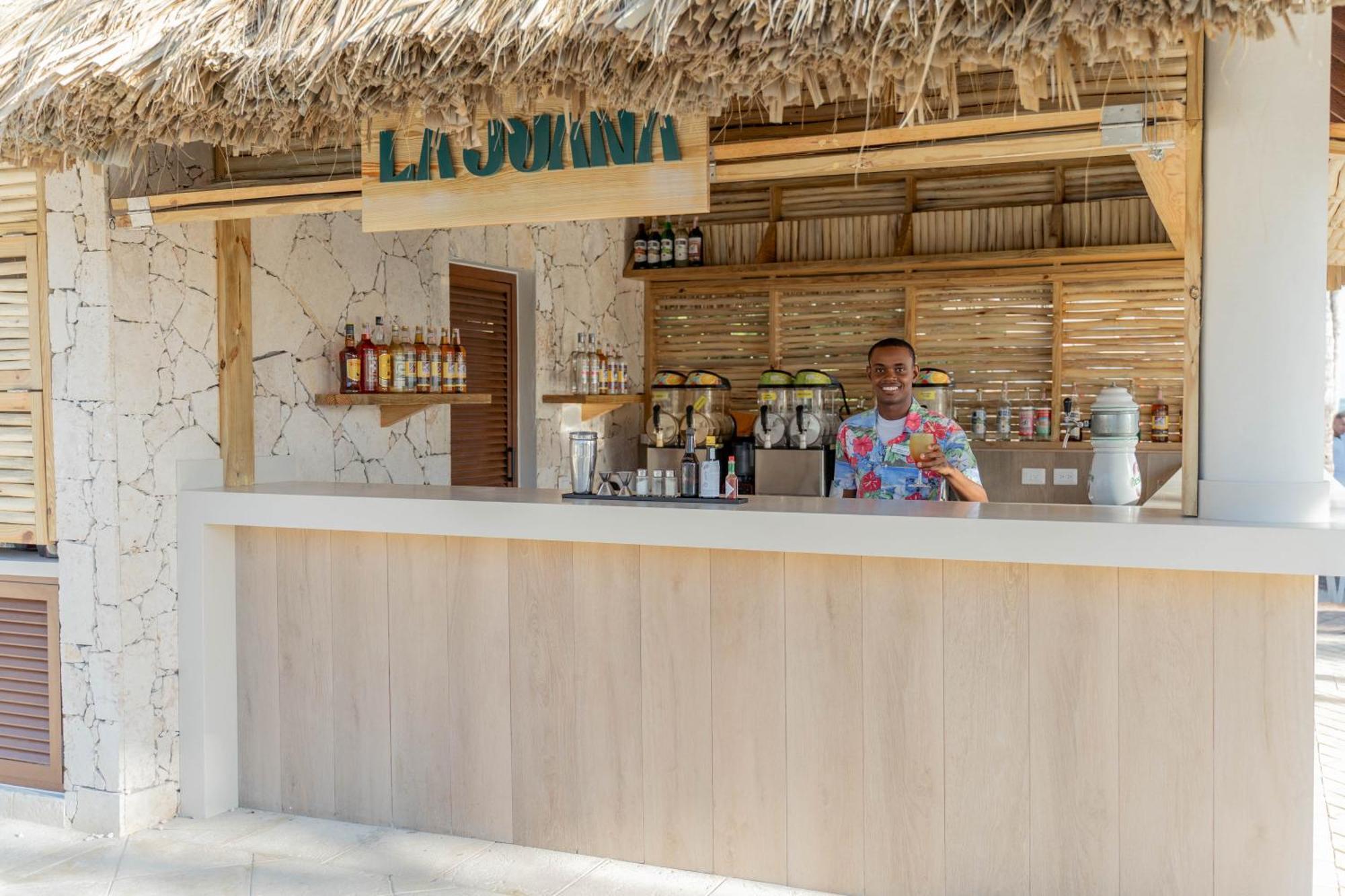 Bahia Principe Grand Punta Cana Hotel Exterior photo A bartender at work